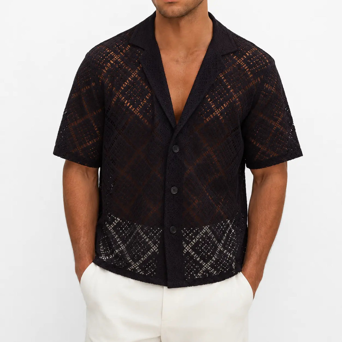 Men's breathable hollow-out shirt for summer, black variant with geometric design, front view on model