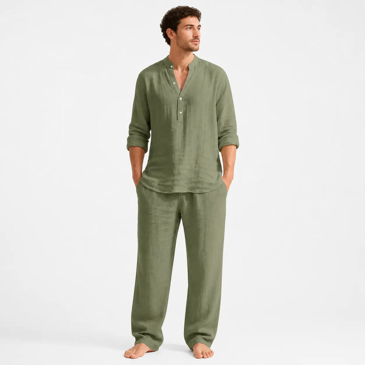 Men's linen henley shirt - solid olive green long sleeve worn by a model with sleeves rolled up