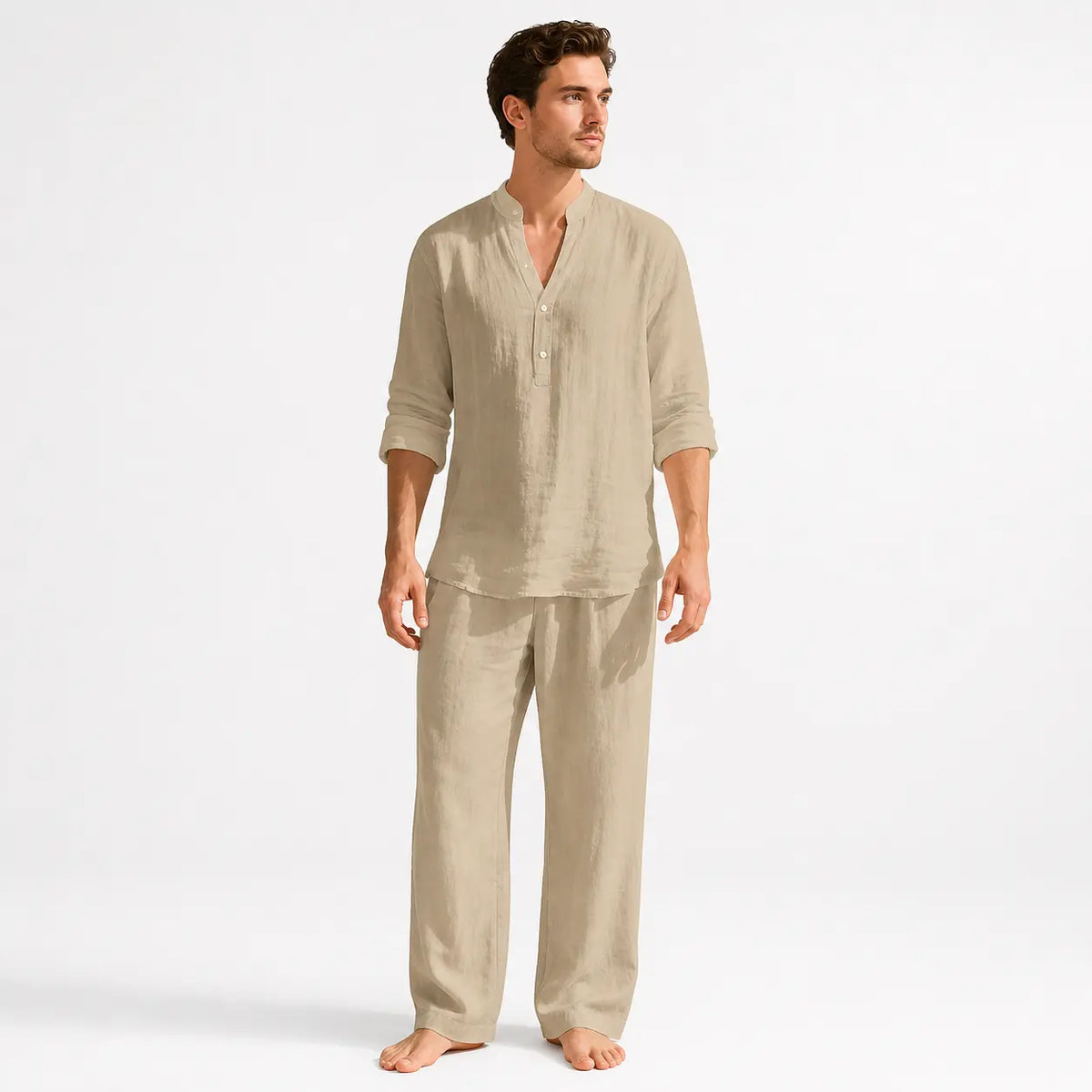 Man wearing beige pajama set on a white background