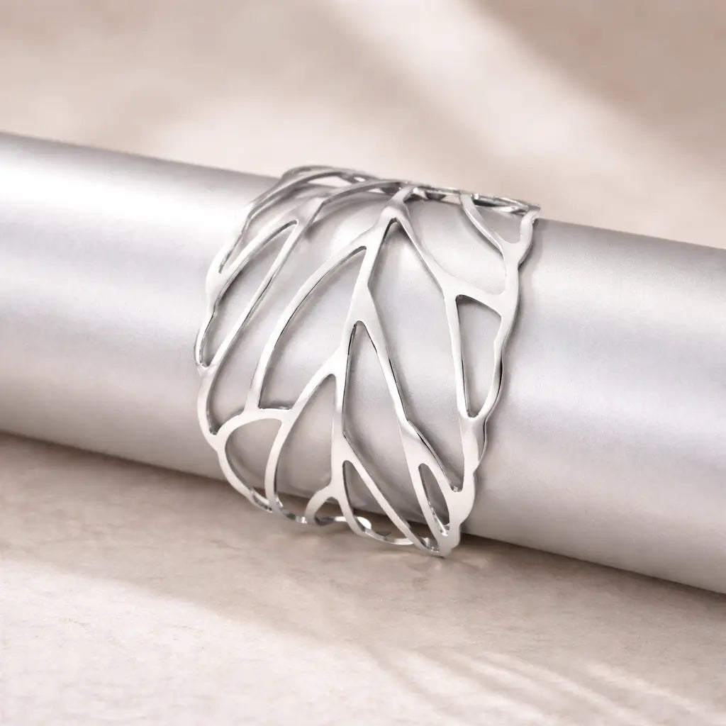Design leaf bracelet for women vintage alloy jewelry silver color displayed on a white cylinder