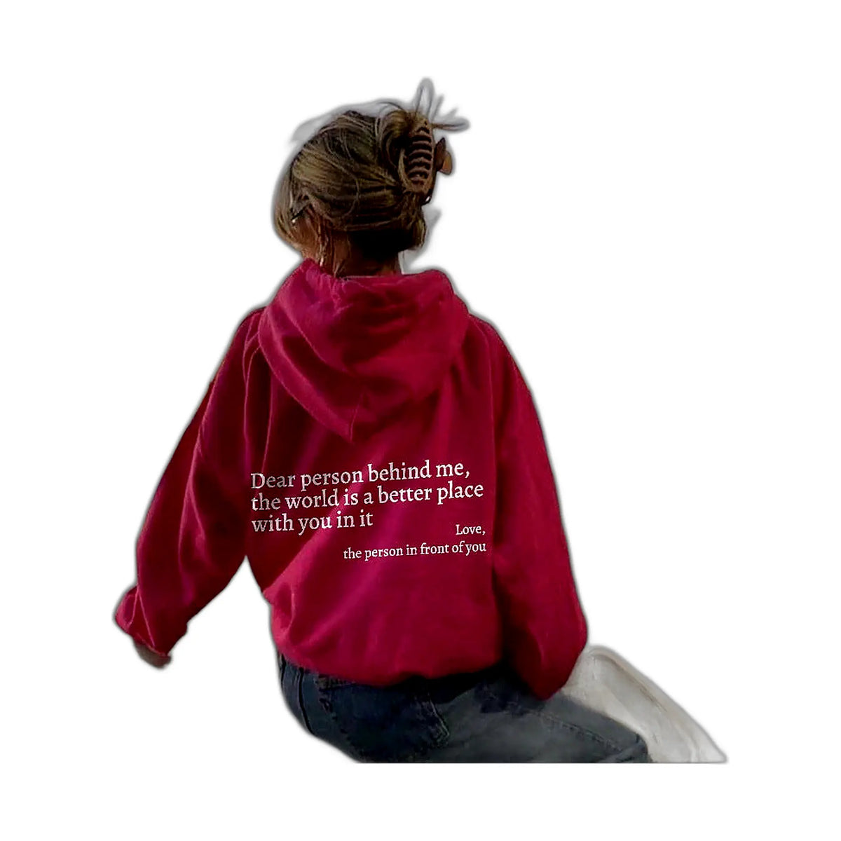 Dear person behind me hoodie: woman wearing red cotton hoodie with white text on back, seated view