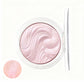 Compact powder with pink swirled design on a white background