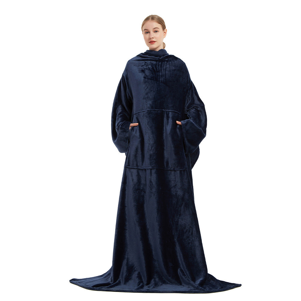 Person wearing a navy blue poncho with a white background
