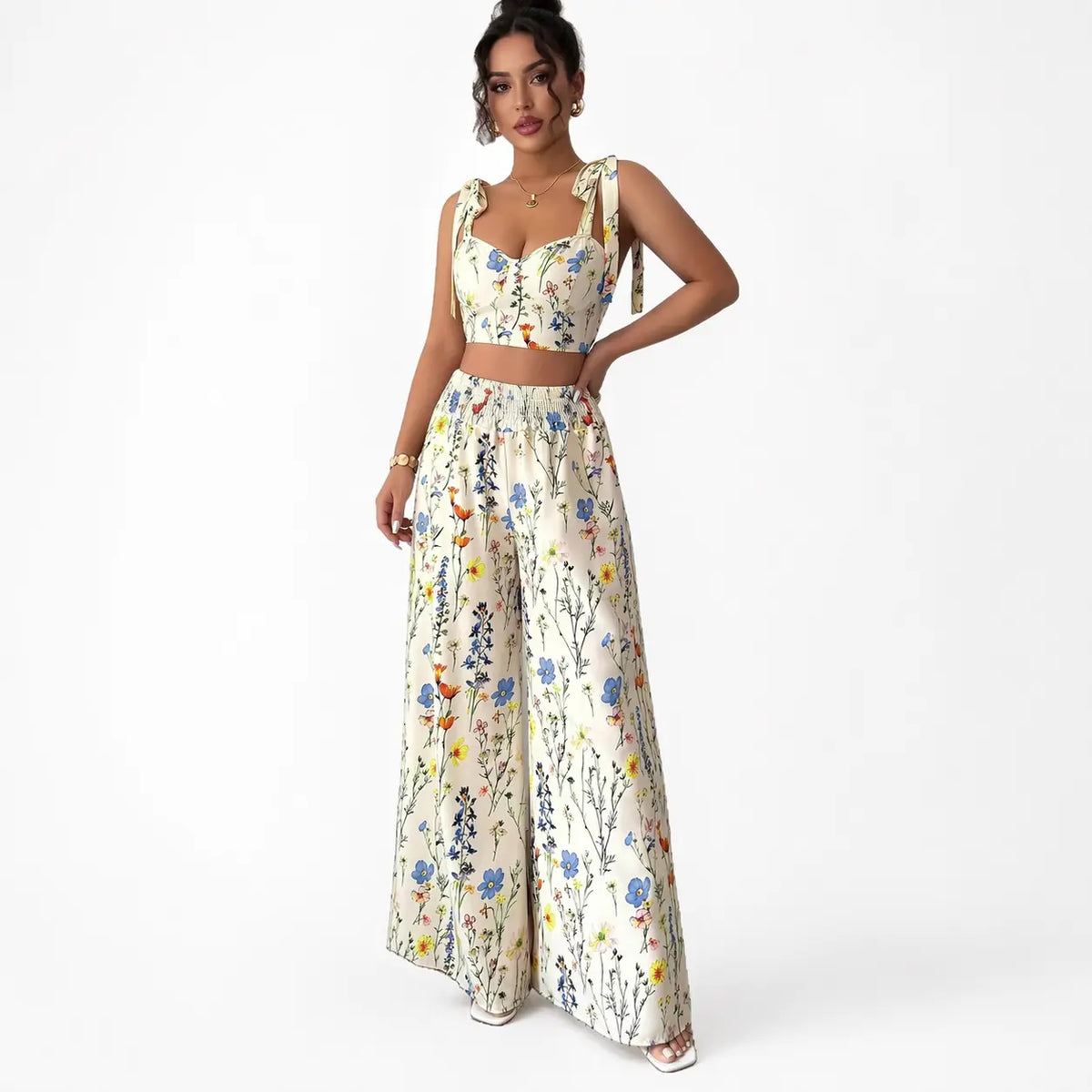 Printed camisole set for women featuring a white floral top and matching wide-leg pants, front view.