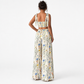 Woman wearing a floral dress on a white background