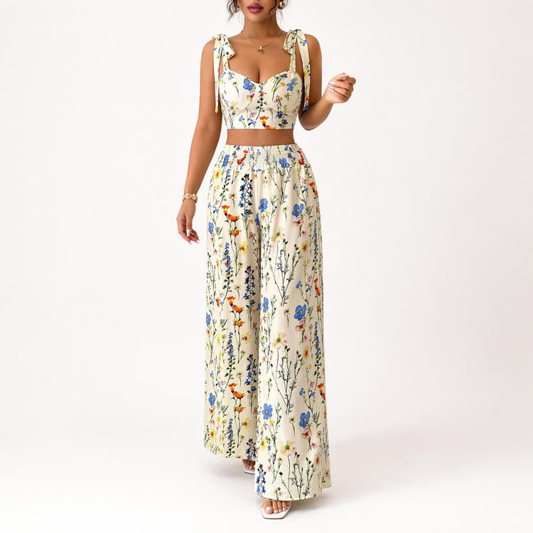 Woman wearing a floral two-piece outfit on a white background