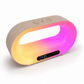 Colorful LED lamp with digital clock on a white background