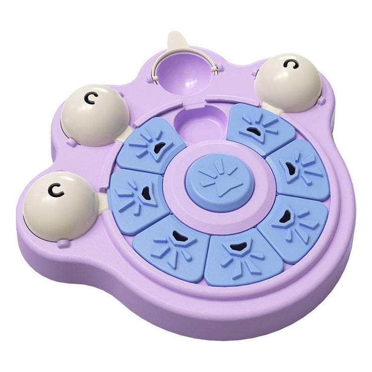 Purple dog puzzle feeder with blue sliding panels and round treat compartments