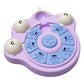 Purple dog puzzle feeder with blue sliding panels and round treat compartments