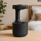 Black electronic device with digital display on a wooden surface, bedroom setting