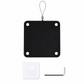 Black square metal plate with holes, white square label, and small tool on a white background
