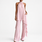 Pink halter top and wide-leg pants set on a white background