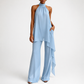 Light blue halter jumpsuit on a white background
