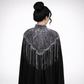 Black cape with intricate silver embroidery and fringe on a white background