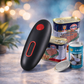 Black handheld device with red button on a surface with canned goods