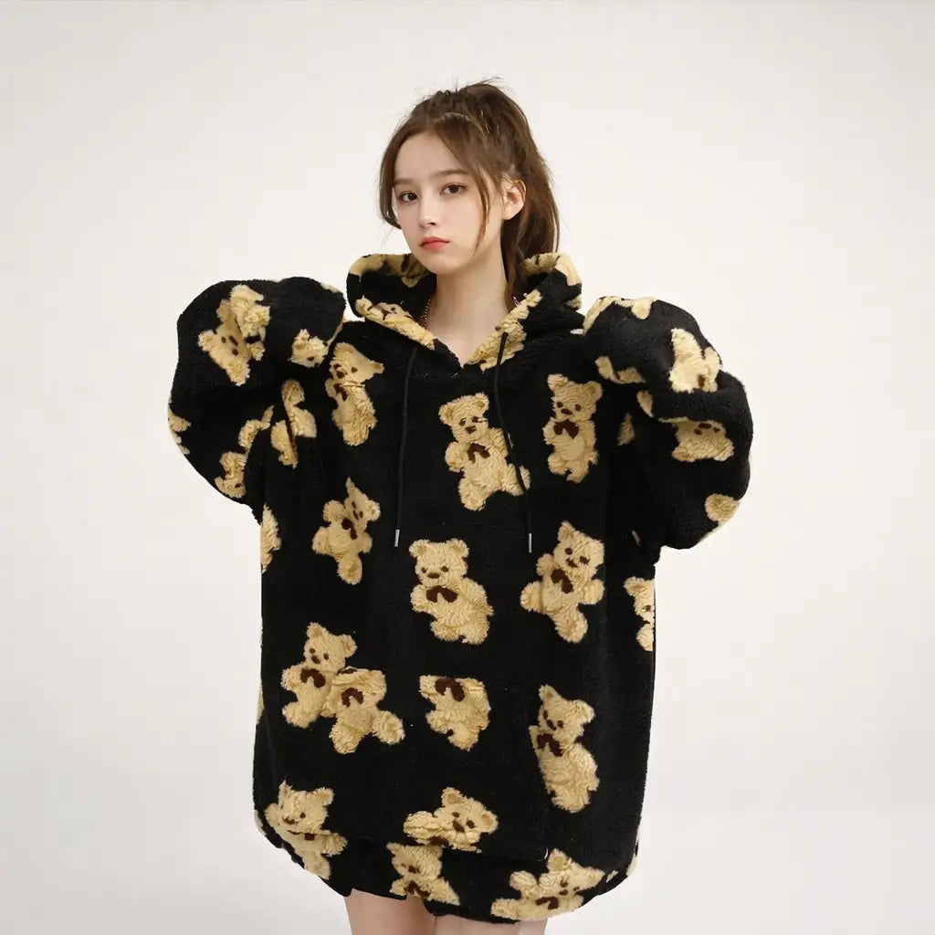Women winter padded hoodie black with beige teddy bear pattern front view on model