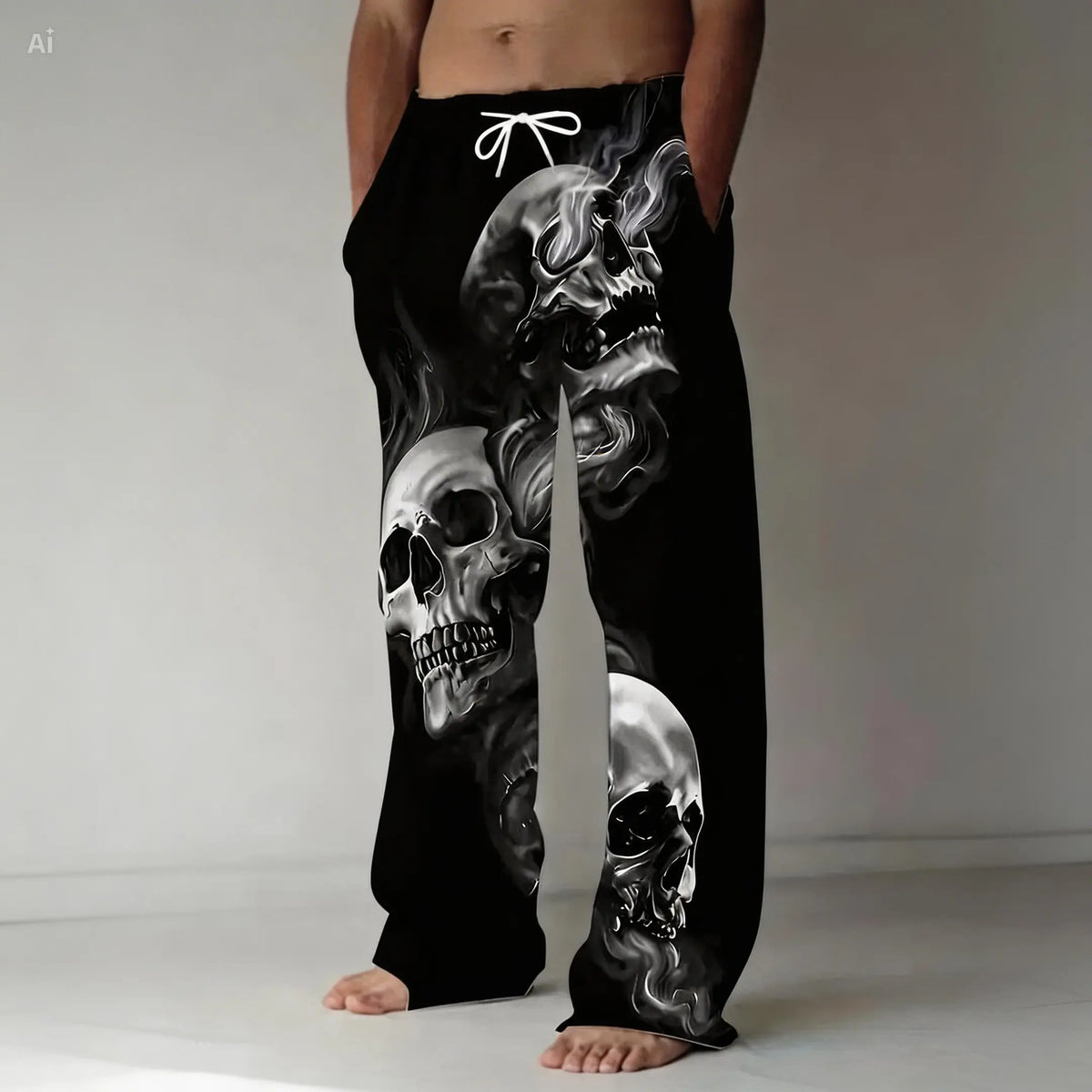 Harajuku 3d print sweatpants with black base and silver skull design, worn by a barefoot model against a white background