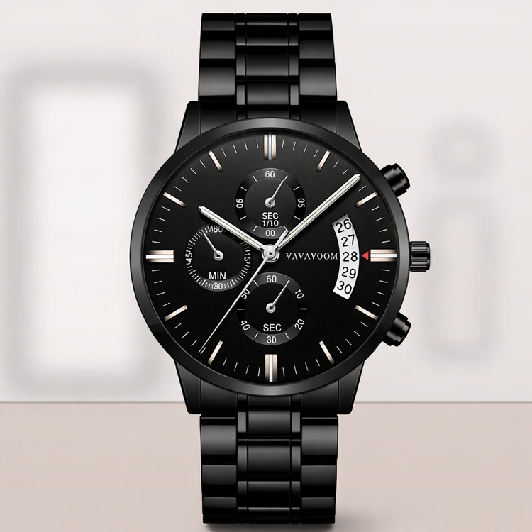 Black wristwatch with detailed face on a light gray background