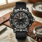 Black wristwatch with detailed face on a map with compasses