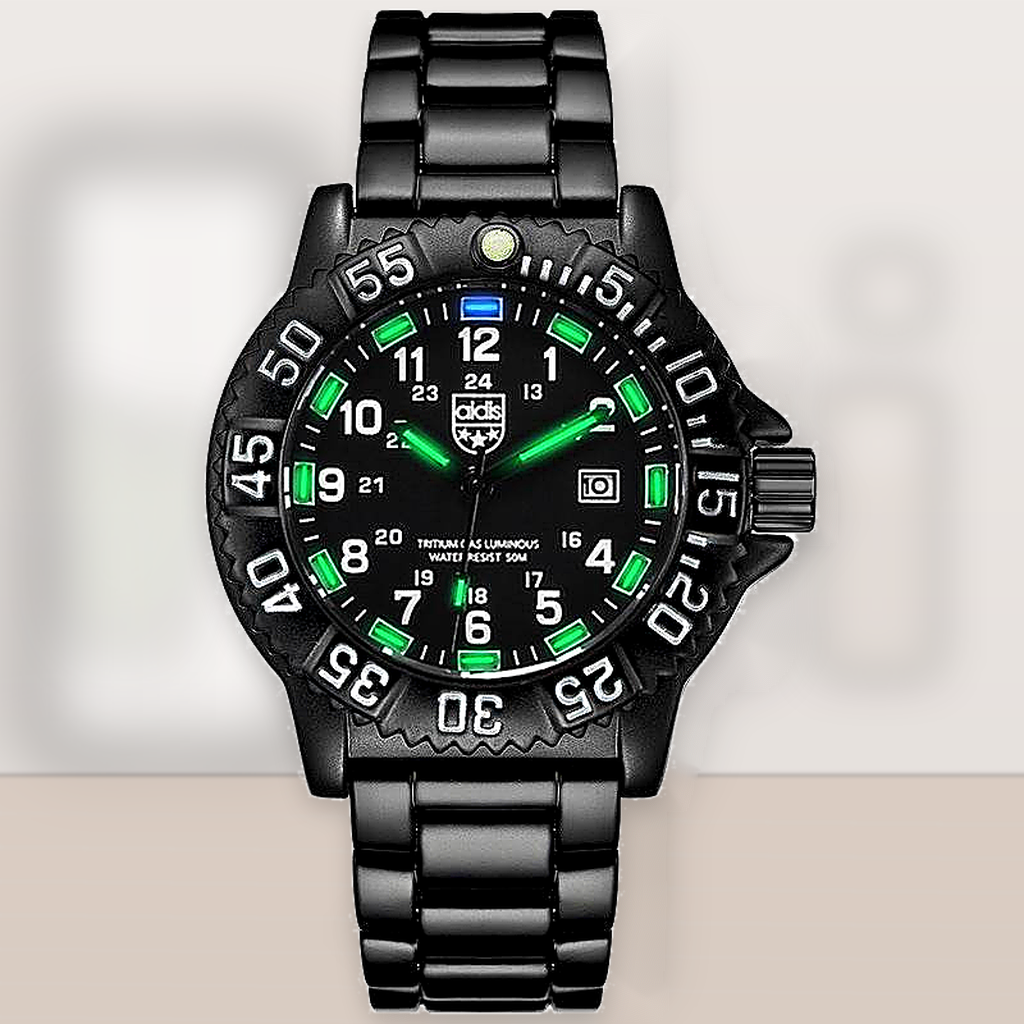 Black wristwatch with green accents on a light gray background