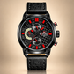 Black wristwatch with red accents on a beige background