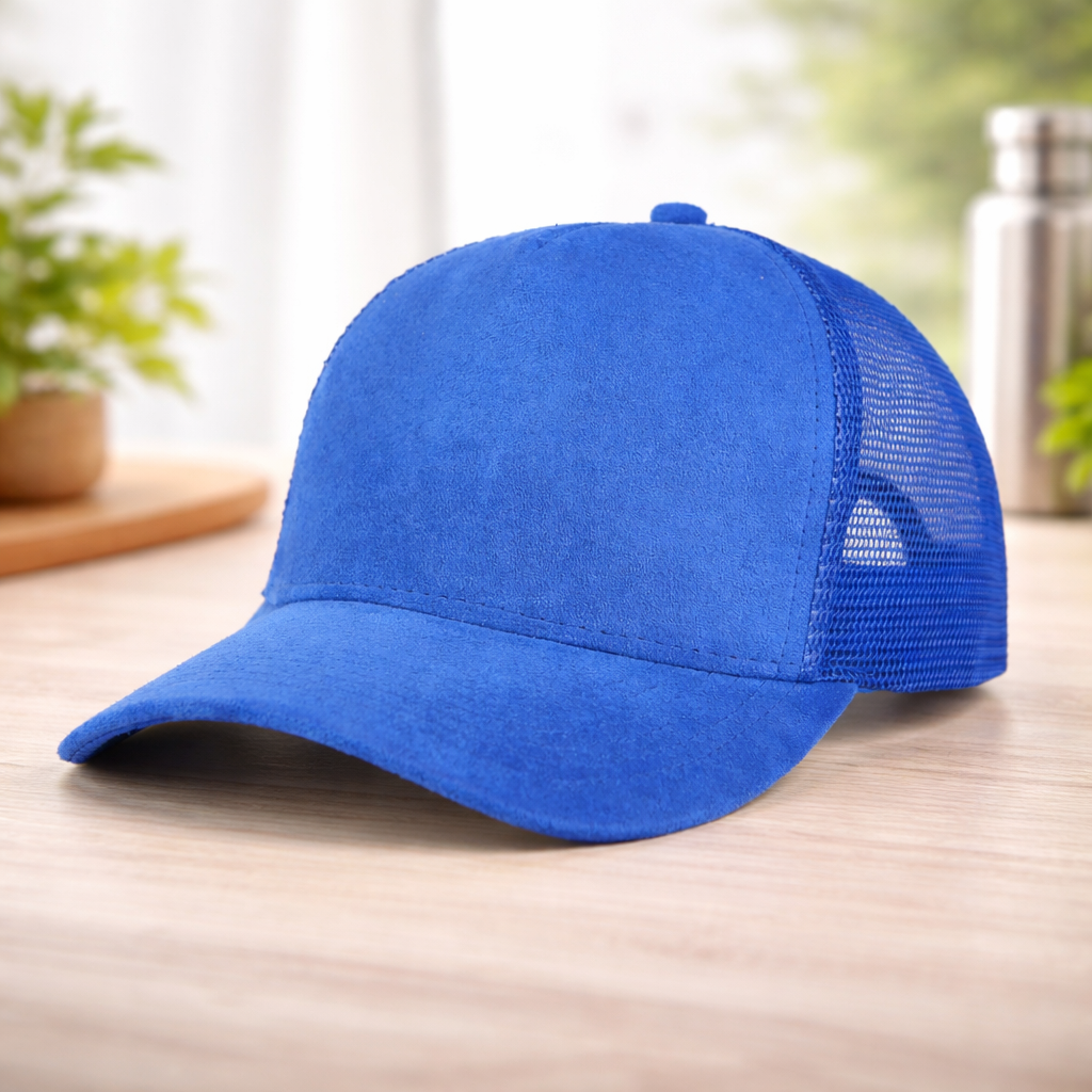 Blue baseball cap on a wooden surface with a blurred background