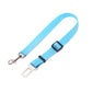 Blue dog leash with a metal clip and white car seat belt adapter on a white background