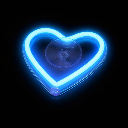 Blue heart-shaped neon light with a suction cup on a black background