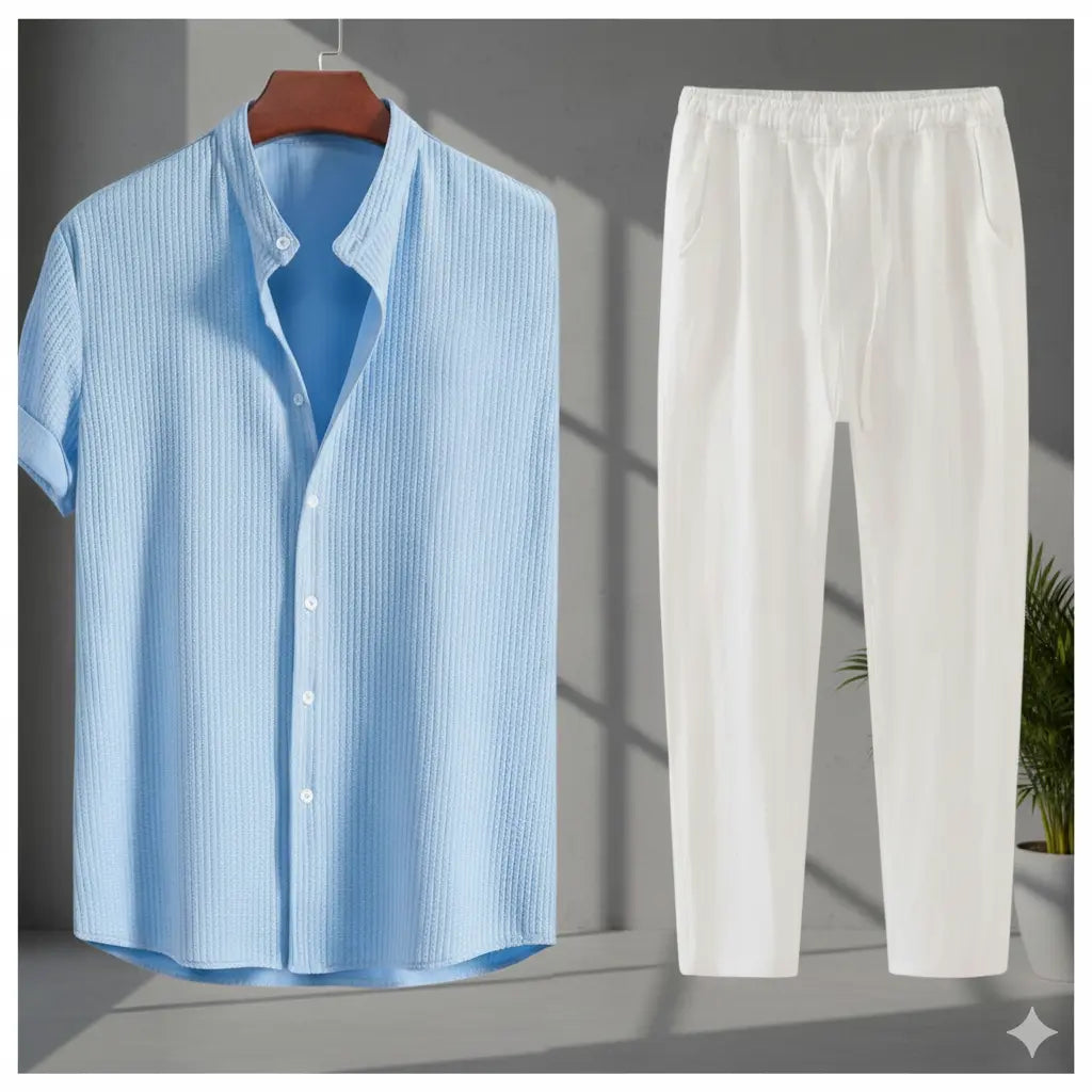 Blue striped shirt and white pants on a gray background