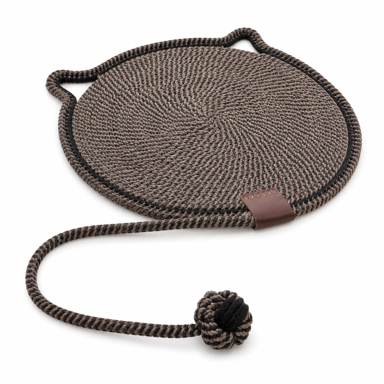 Round woven mat with a rope handle and knot on a white background