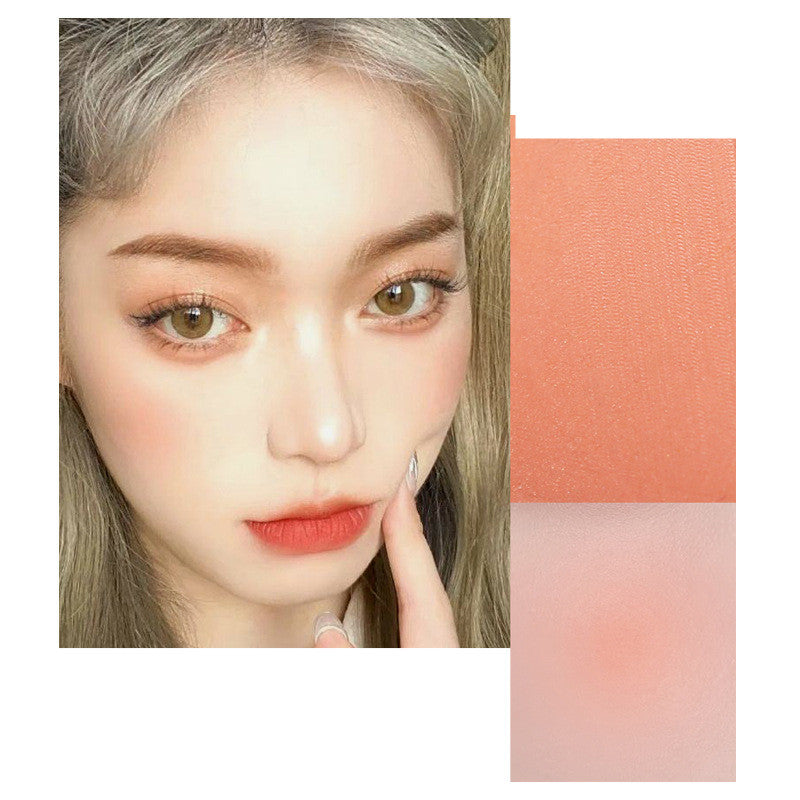 Close-up of a person with orange makeup and color swatches on the right