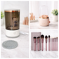 Collage of a humidifier, makeup brushes, and a cleaning mat on a marble surface.