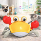 Colorful crab-shaped toy with music notes and two cats in a room.