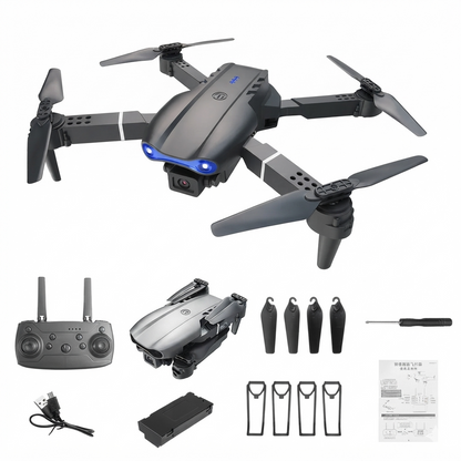 E99Pro foldable drone hovering over a snowy field with remote controller and smartphone display