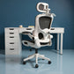 Ergonomic office chair in front of a white desk with drawers against a blue wall White Frame Black Net Hollow out style
