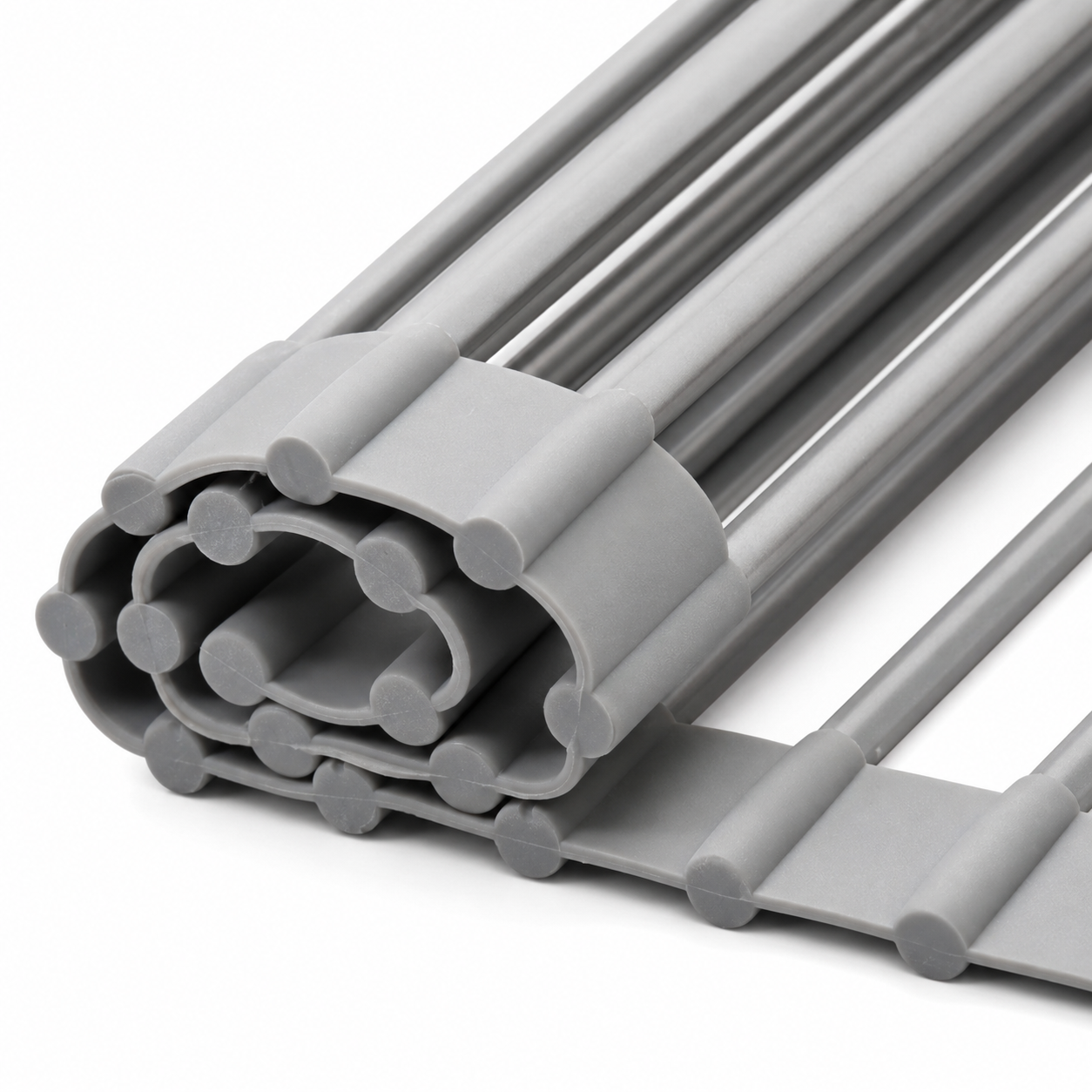 Stack of gray plastic profiles on a white background