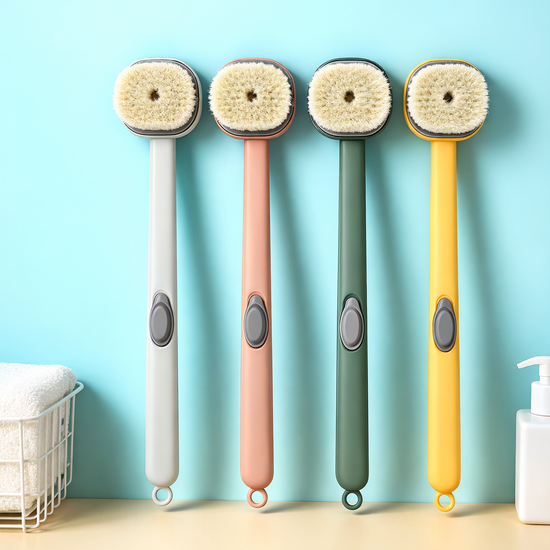 Four colorful scrub brushes with bristle heads on a light blue background