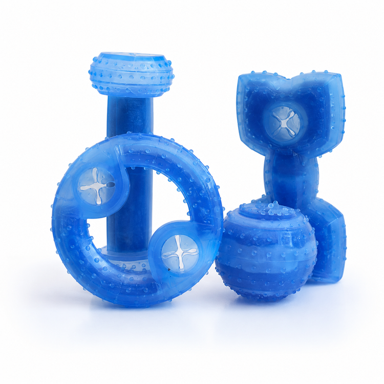 Set of blue rubber dog toys on a white background