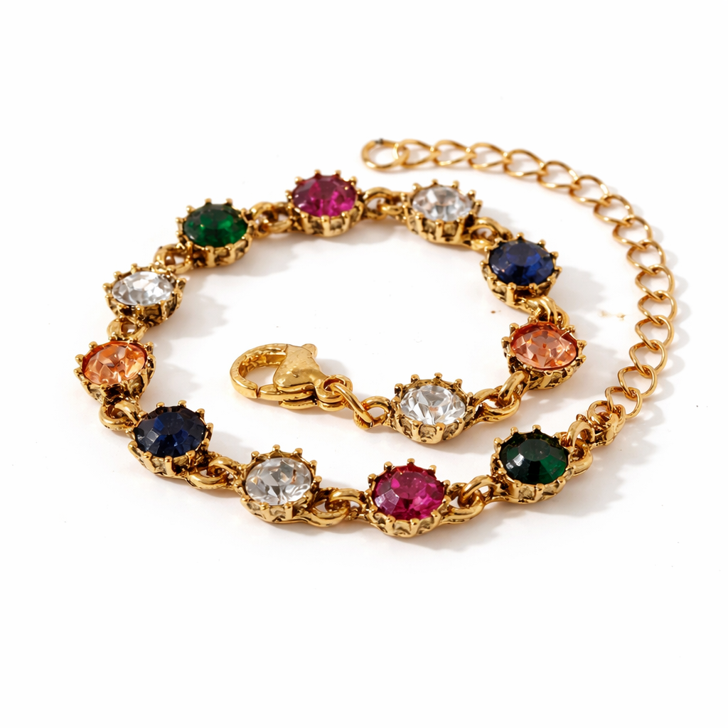 Gold bracelet with multicolored gemstones on a white background