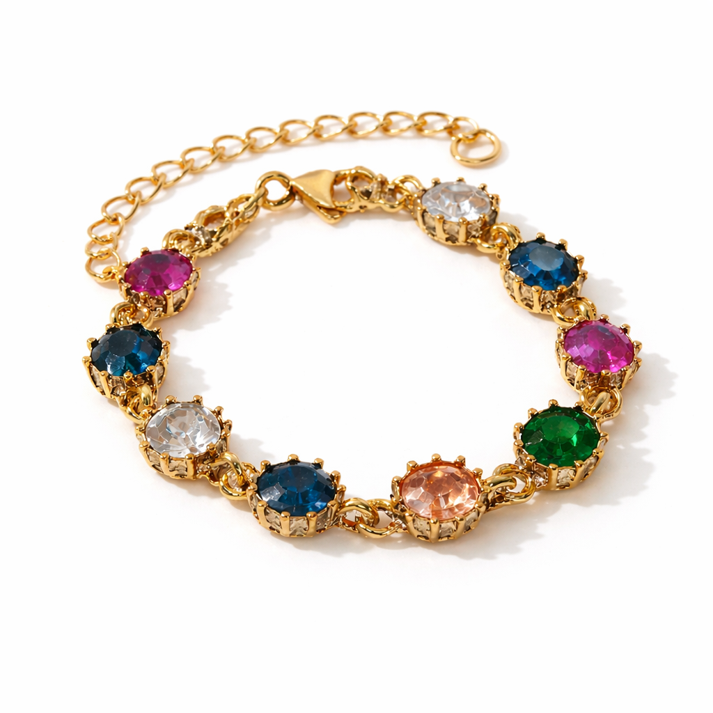 Gold bracelet with multicolored gemstones on a white background