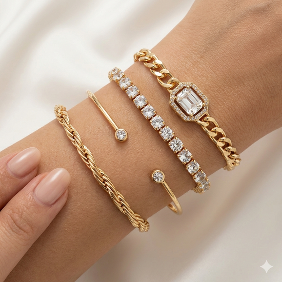 Gold bracelets with various designs on a white background