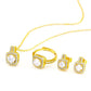 Gold jewelry set with necklace, ring, and earrings on a white background