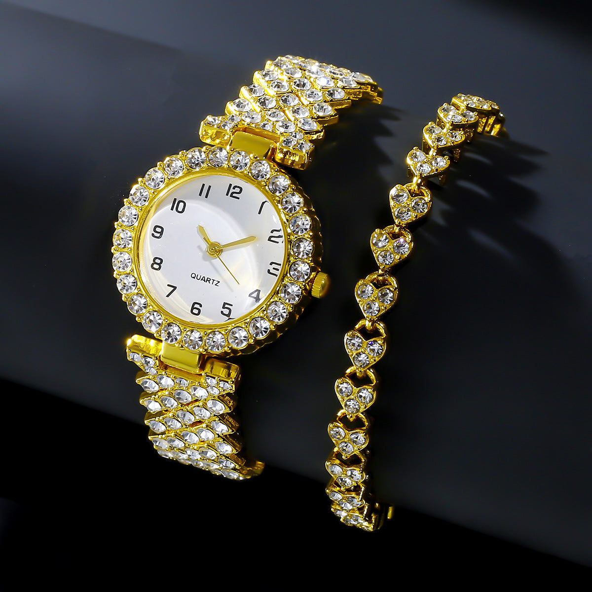 Gold watch with diamond-studded band on a black background