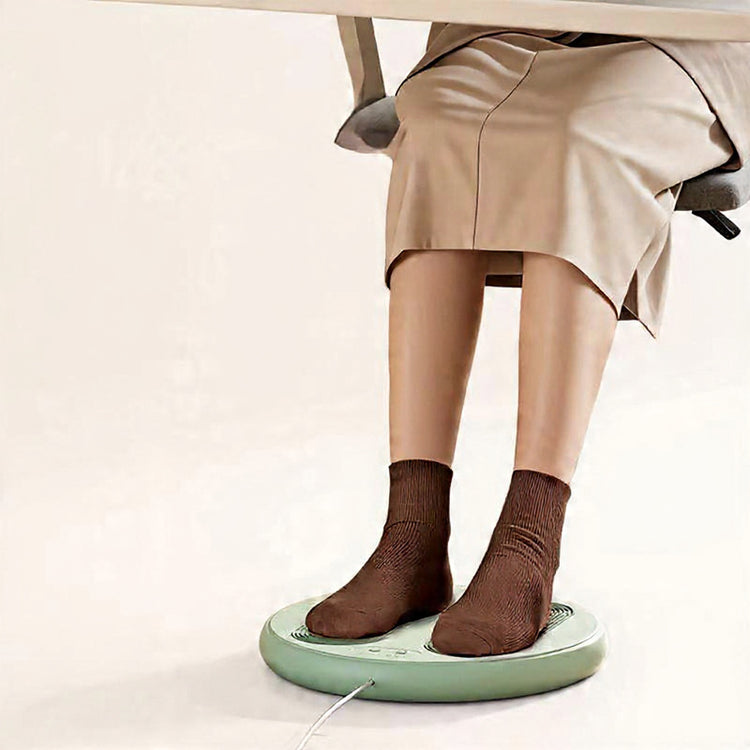 Green Massage foot warmer with text on a beige background