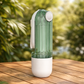 Green and white water bottle on a wooden surface with a blurred natural background GREEN