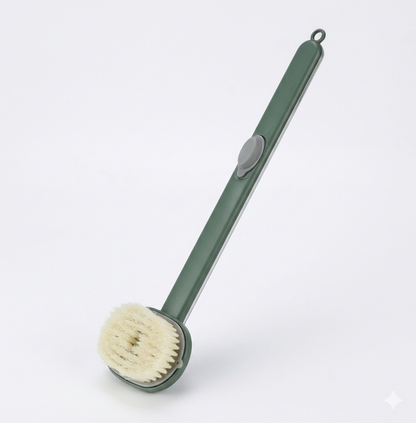 Green dish brush with bristle head on a white background