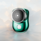 Green electric shaver on a light gray background GREEN