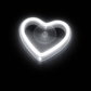 Heart-shaped suction cup on a black background