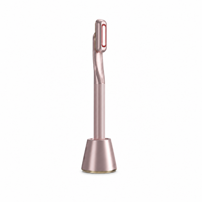 Rose gold hair removal device on a white background