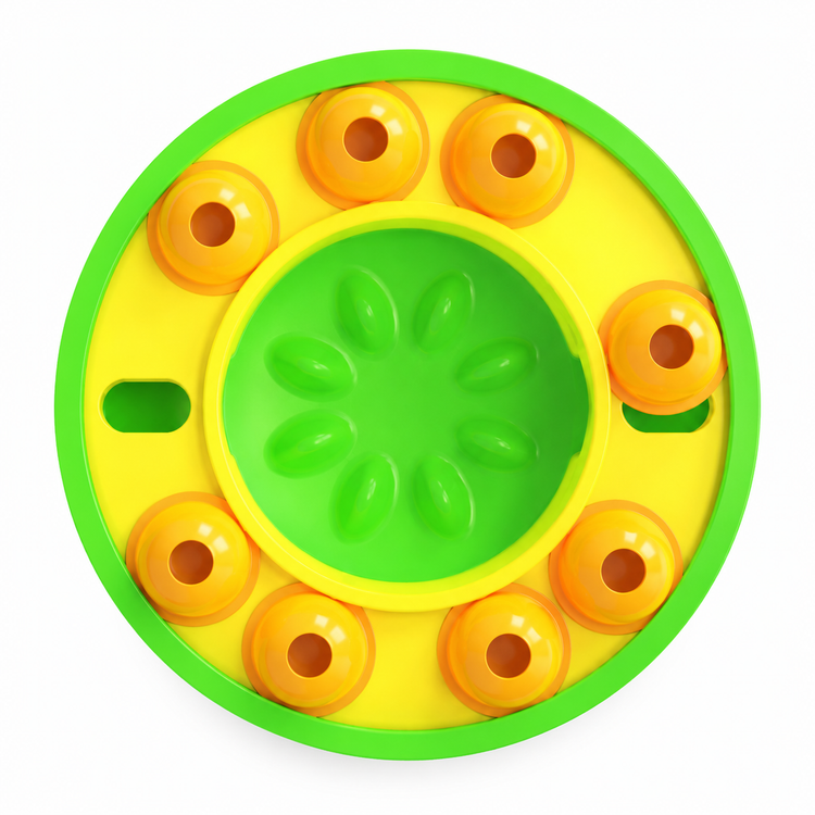 Round yellow and green toy with circular patterns on a white background